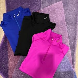 Three NIKE cool/winter weather running tops